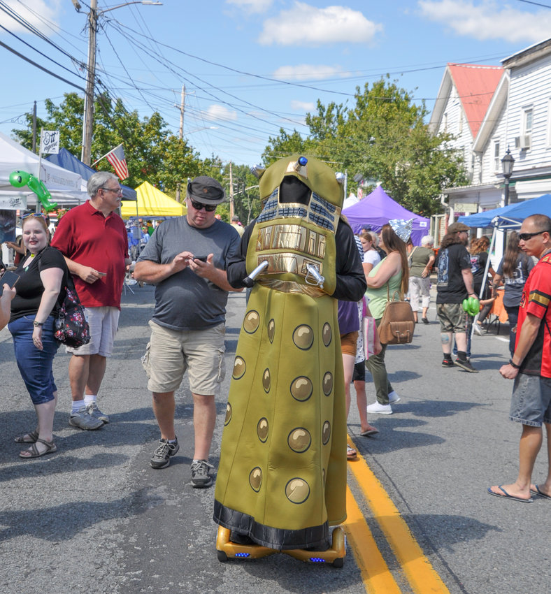 The Daleks (one is pictured here) are a fictional extraterrestrial race of mutants, principally portrayed in the British television series "Doctor Who." The Daleks were conceived by science fiction writer Terry Nation and first appeared in the 1963 serial, in shells designed by Raymond Cus.